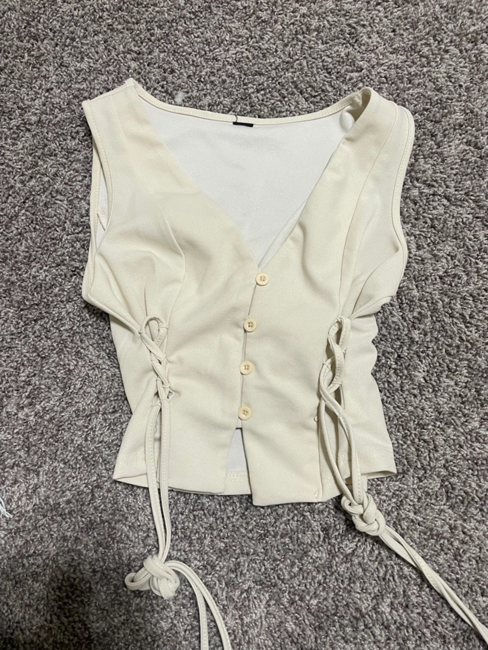 Sleeveless Cream Button-Front Lace-Up Top